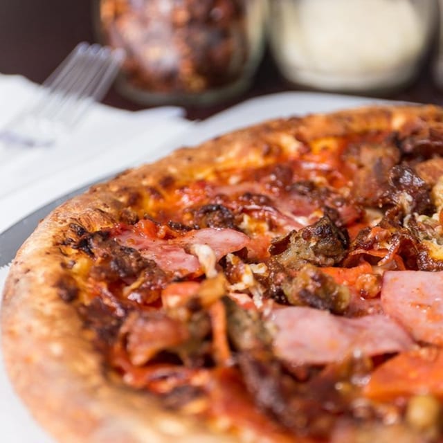 Extra Large Meat Lovers Pizza.