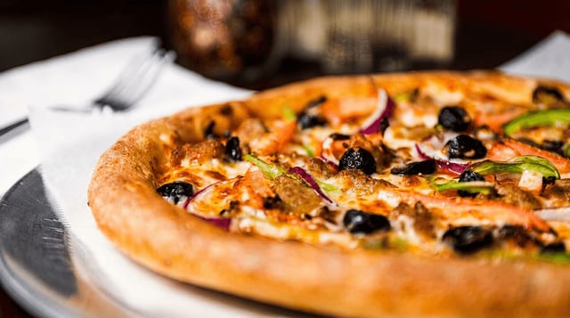 Medium Supreme Pizza.